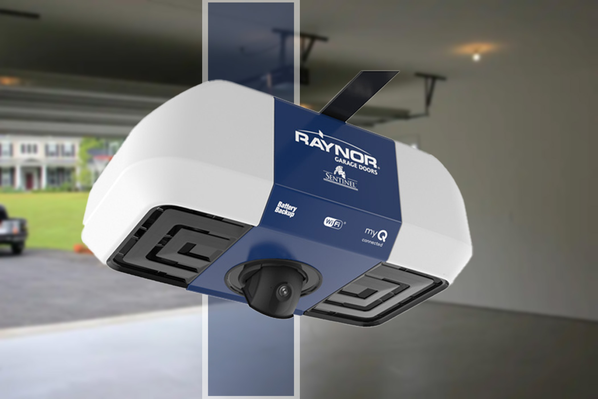 Raynor garage door opener mounted on the ceiling rail